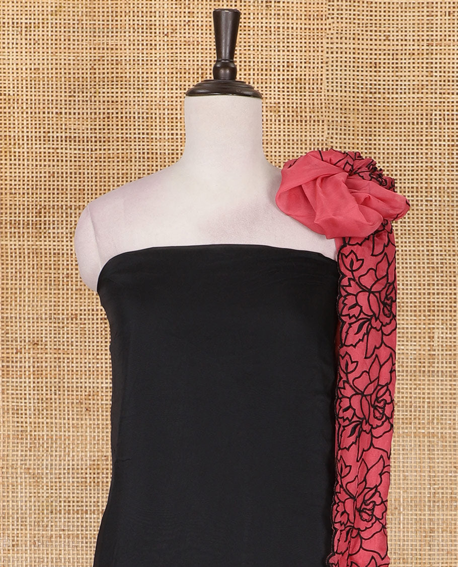 Black and rani pink organza material churidar set, Lucknowi chikankari floral vine embroidery top, plain bottom, and contrast floral embroidery dupatta
