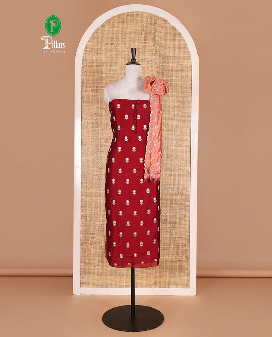 Magenta Vichitra silk material churidar set, floral motifs embroidered top, contrast Santoon bottom, and floral vine thread embroidered scallop dupatta