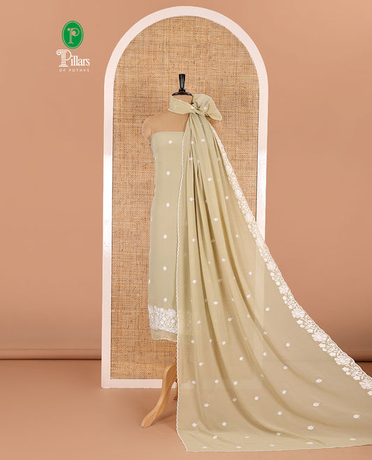 Green material chudidar set, floral thread embroidered georgette top, plain bottom, and floral motifs embroidered scallop georgette dupatta