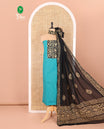 Blue Material Chudidar Set Elevated with Kantha Embroidery, Batik Print, and Mirror Work on the Cotton Top, Comes with a Batik Geometric Patterns Printed Bottom, and a Cotton Batik Geometric Printed Dupatta