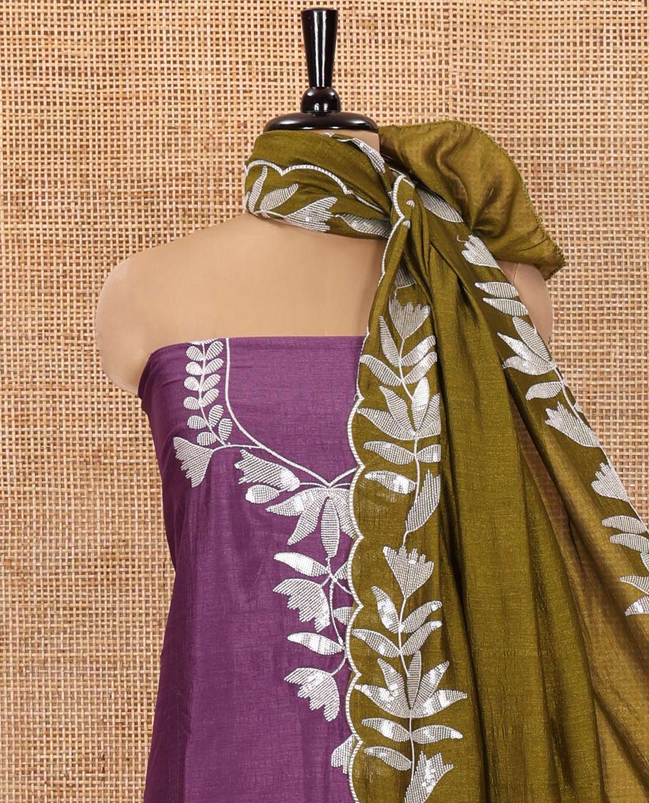 Dark Lavender Material Churidar Set, Detailed with Floral Motifs Sequins-Thread Embroidered on Its Vichitra Silk Top, Comes with a Contrast Santoon Bottom, and Paired with a Vichitra Silk Floral Embroidered Scallop Dupatta