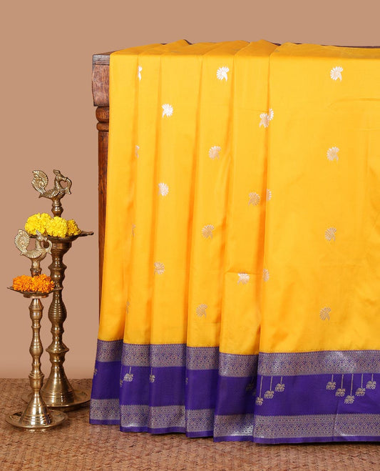 Yellow floral zari buttas semi-soft silk saree, contrast traditional motif zari border & pallu of paisleys & checks