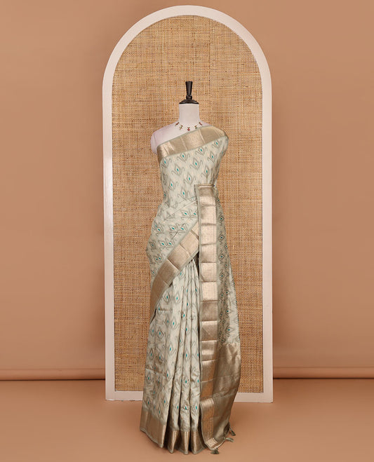 Pista green pochampally ikkat style motifs fancy tussar saree, traditional zari border, zari rich intricate pallu, and matching blouse