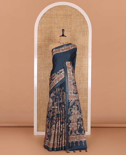 Peacock blue kalamkari human figurines printed fancy tussar saree, floral printed border, human figurines printed pallu, and a matching blouse