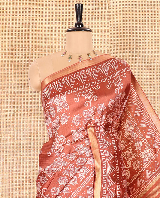 Rust Banana Pith Saree Embellished with Floral-Intricately Motifs Discharge Print All Over Its Body, Zari Bavanji Border, Pallu Subtly Woven in Intricate Print and Zari Weave, and Paired with a Matching Blouse