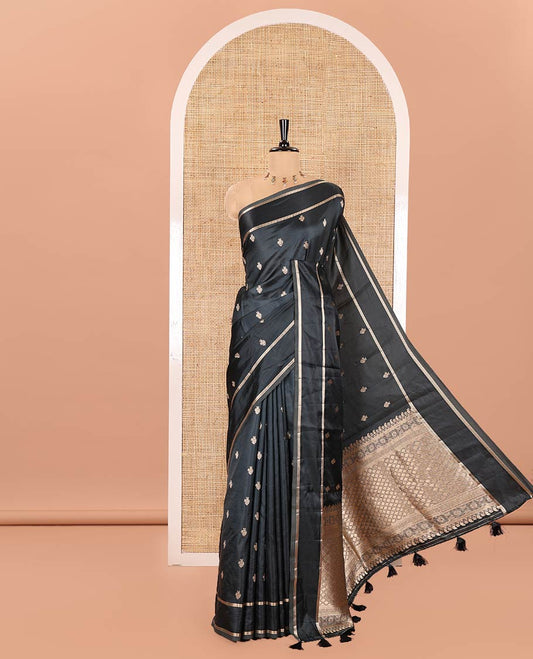 Black Semi-Banaras Satin Silk Saree, Decked Up with Zari Buttas All Over Its Body, Highlighted by Zari Striped Border, Grand Jaal Pallu, and Paired with a Matching Blouse