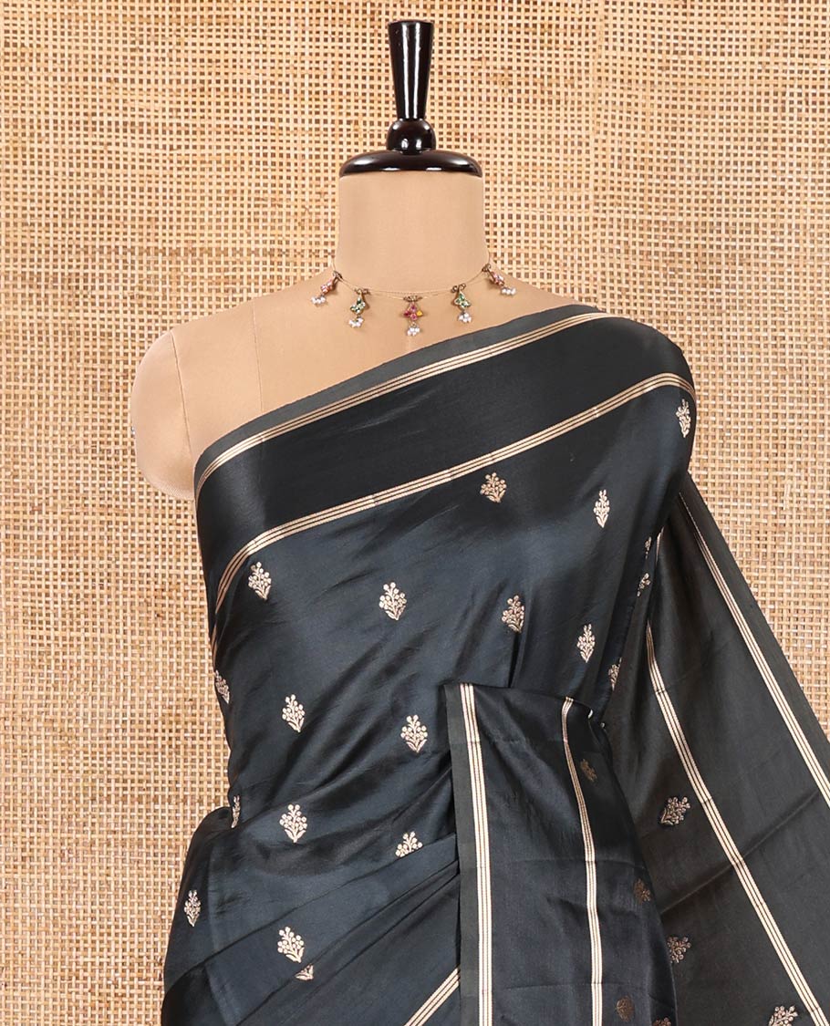 Black Semi-Banaras Satin Silk Saree, Decked Up with Zari Buttas All Over Its Body, Highlighted by Zari Striped Border, Grand Jaal Pallu, and Paired with a Matching Blouse