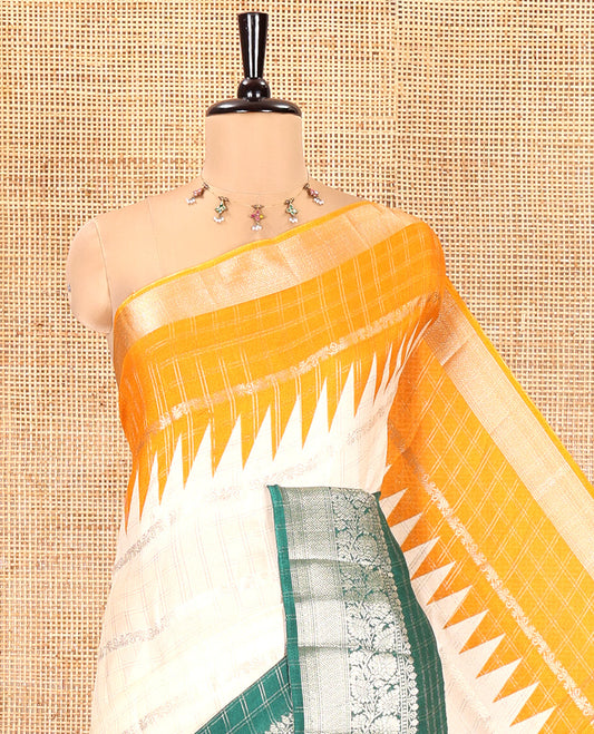 Off-White Fancy Georgette Saree, Enriched with Zari Designs, Complemented by a Contrast Ganga-Jamuna Zari Temple Border of Traditional Designs, Pallu of Paisleys, and Paired with a Contrast Blouse