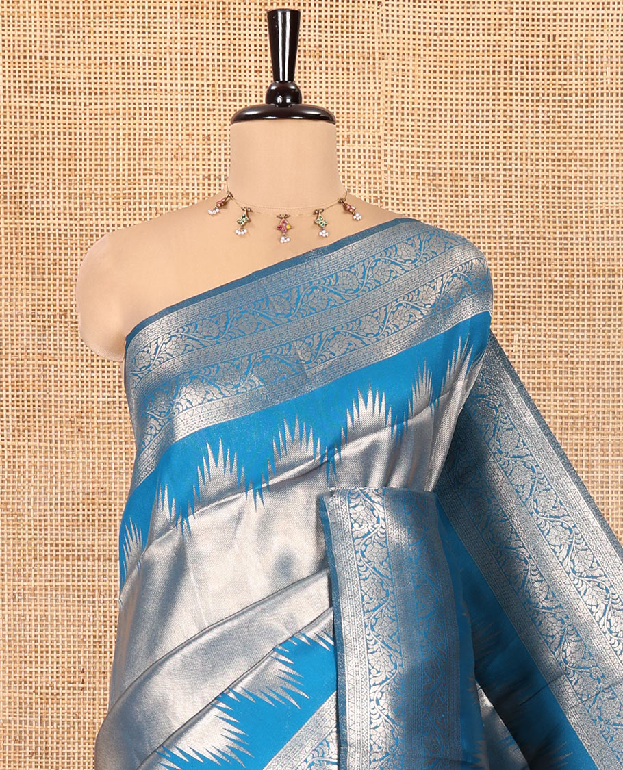 Rama Blue Litchi Saree Features Tissue-Zari Weave, a Temple Kodi Visiry Border, Grand Pallu and a Matching Blouse