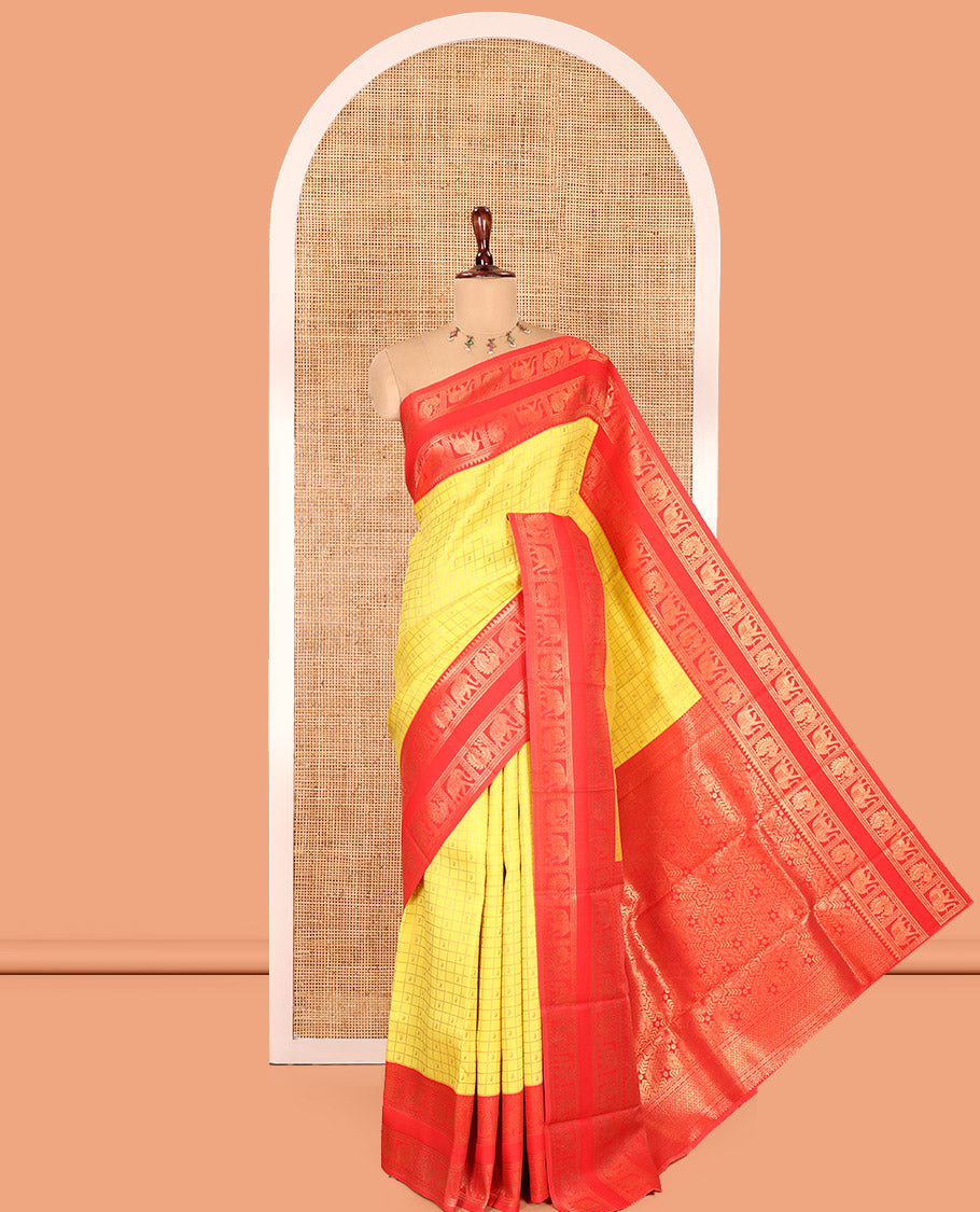 Yellow Litchi Saree, Detailed with Paisley Butta Enclosed Checks, Complemented by a Contrast Rettai Pettu Peacock-Elephant Border, a Contrast Blouse