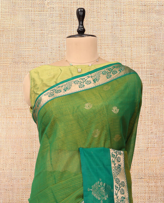 Green Silk Cotton Saree, Ornamented with Zari Buttas, a Contrast Floral Creeper Border, Jaal Pallu, and a Contrast Blouse