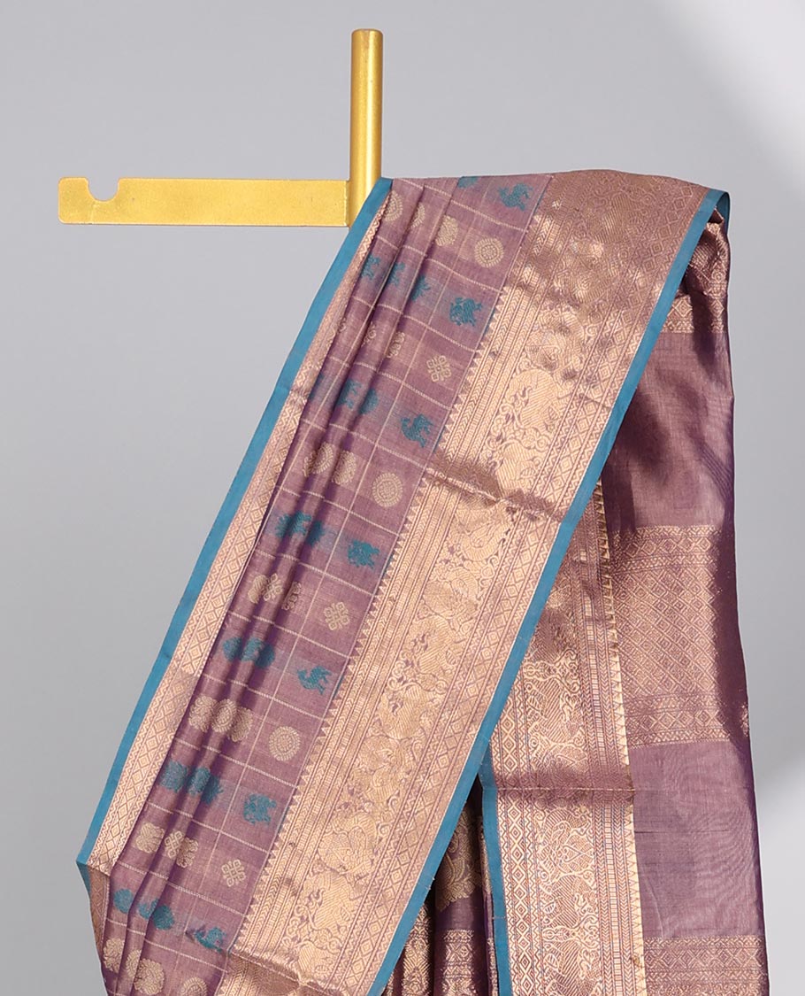 Mauve motifs enclosed with checked cotton silk saree with contrast striped border & zari floral design pallu