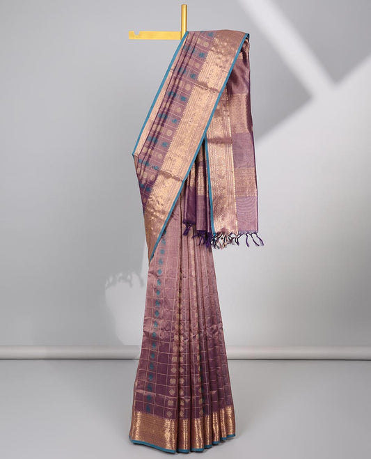 Mauve motifs enclosed with checked cotton silk saree with contrast striped border & zari floral design pallu