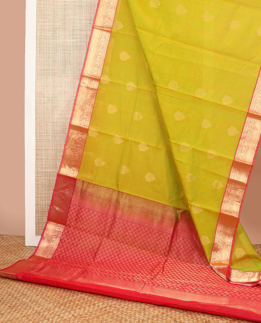 Light green floral motifs silk cotton saree with contrast intricate zari design border & argyle design pallu
