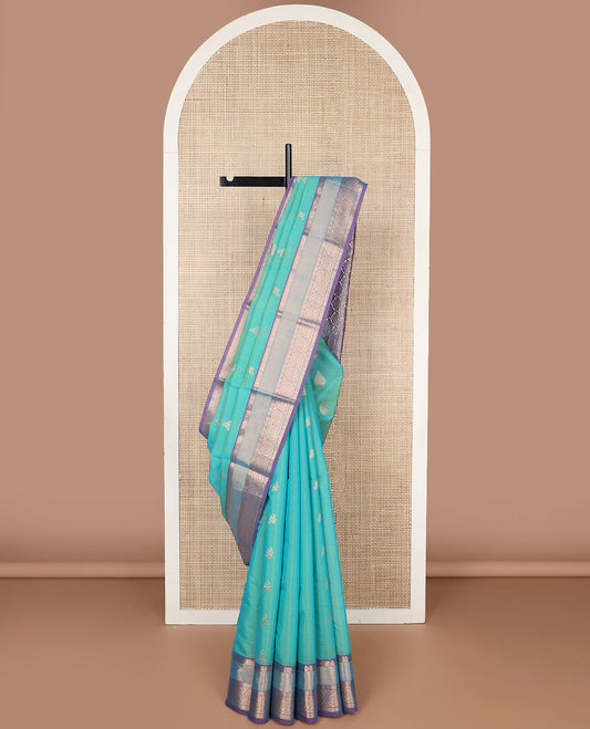 Sea green motifs silk cotton saree with contrast zari design border & ogee design pallu