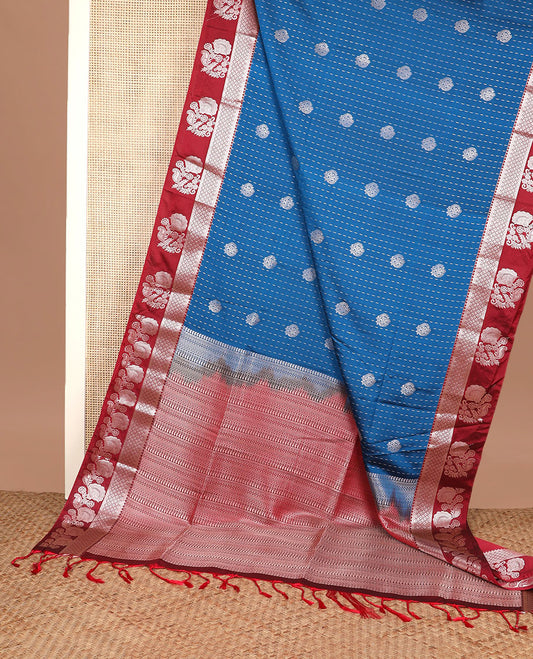 Blue zari buttas soft silk saree, contrast traditional design zari border, and pallu of traditional designs