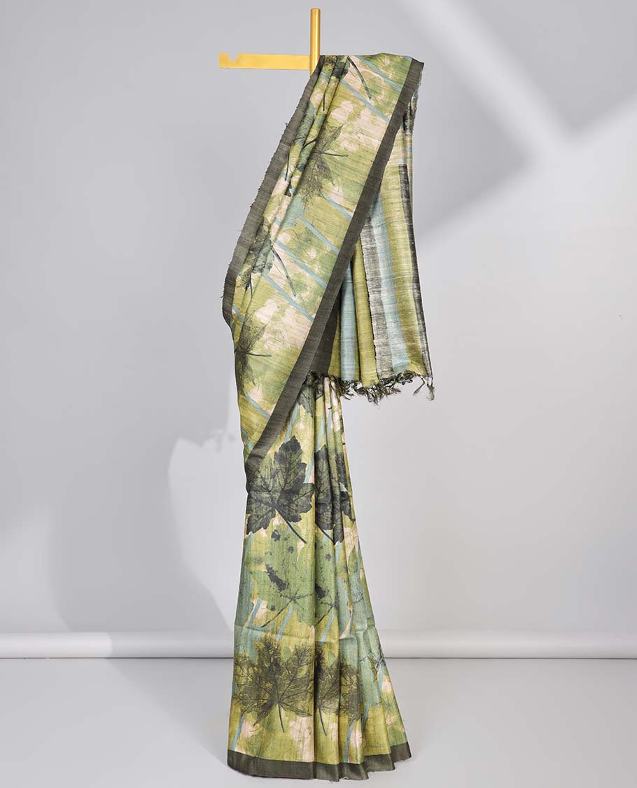 Green leaf printed tussar silk saree with self-border & checked pallu