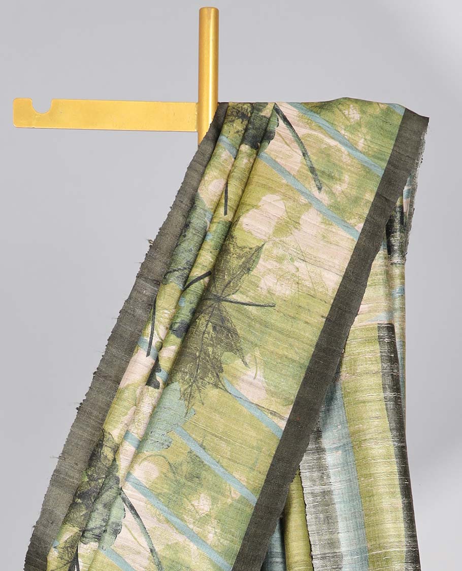 Green leaf printed tussar silk saree with self-border & checked pallu