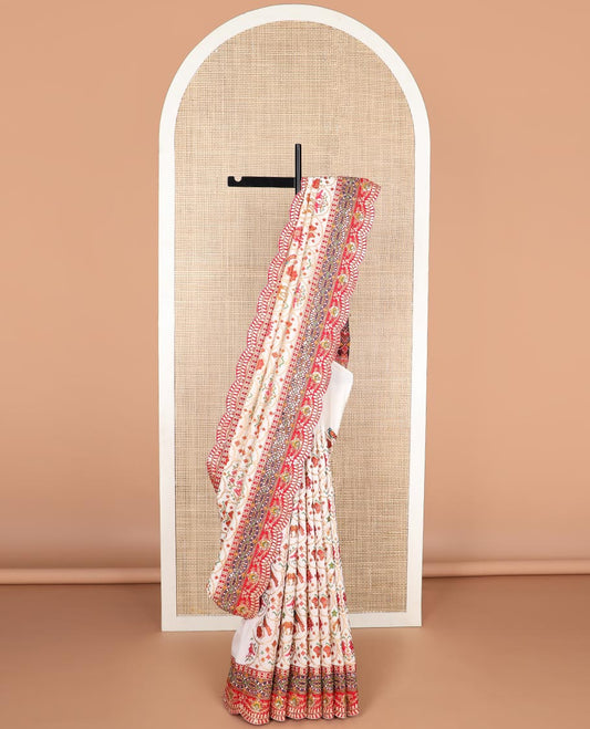 White ikkat style thread embroidery tussar silk saree with embroidery scallop border & floral ikkat style pallu