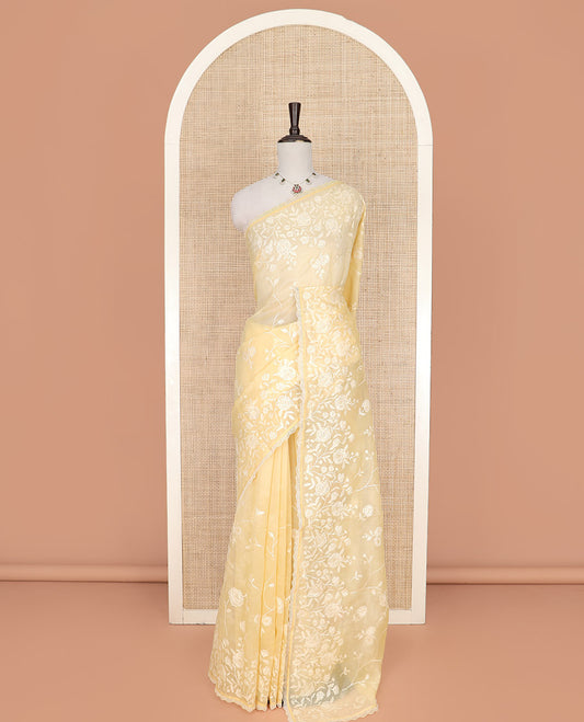 Yellow Crushed Saree, Subtly Sparkled with Silhouette-style Floral Vine Designs On Its Body, Subtle Self-Border, Pallu of Same Designs, and Paired with a Matching Blouse