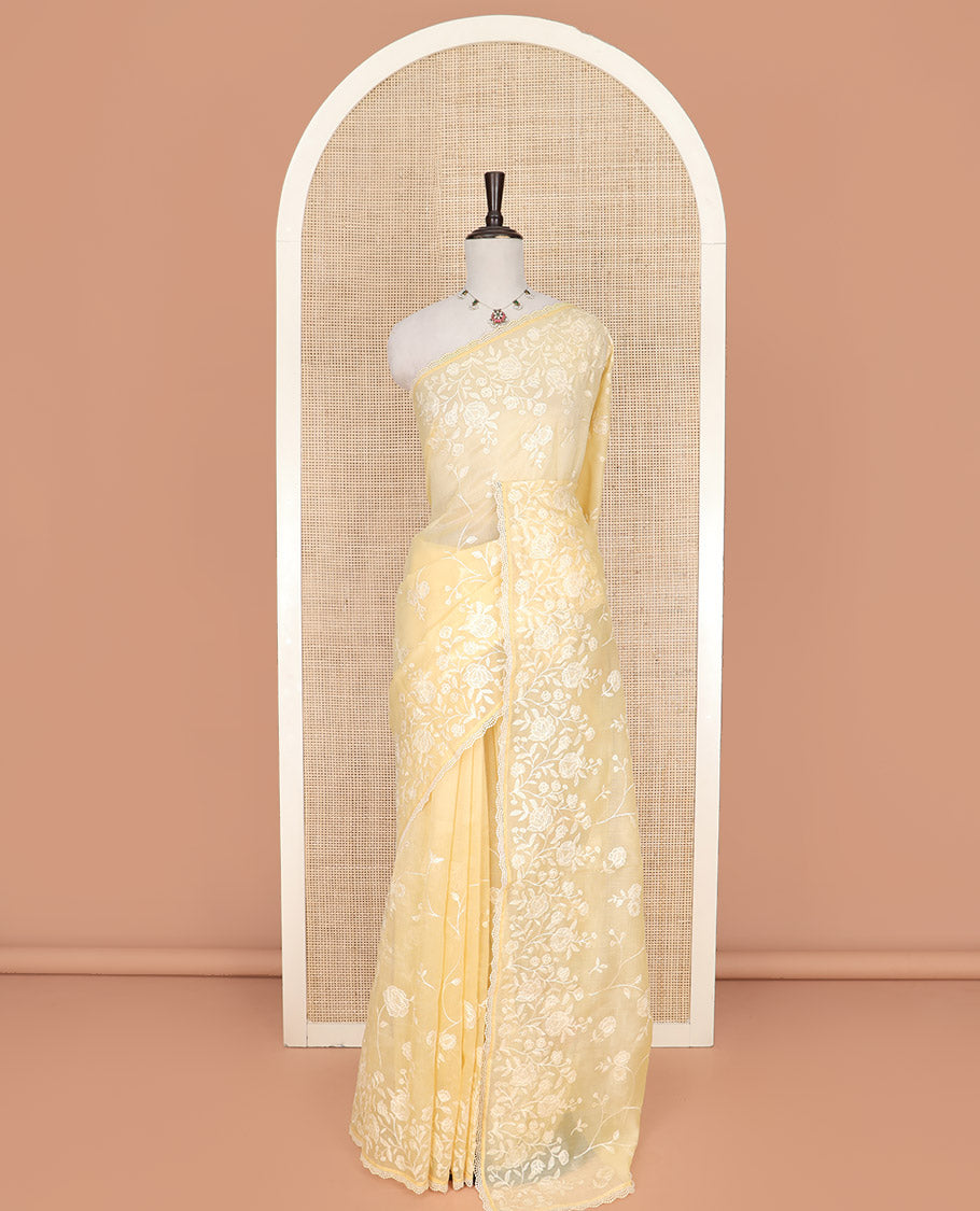 Yellow Crushed Saree, Subtly Sparkled with Silhouette-style Floral Vine Designs On Its Body, Subtle Self-Border, Pallu of Same Designs, and Paired with a Matching Blouse