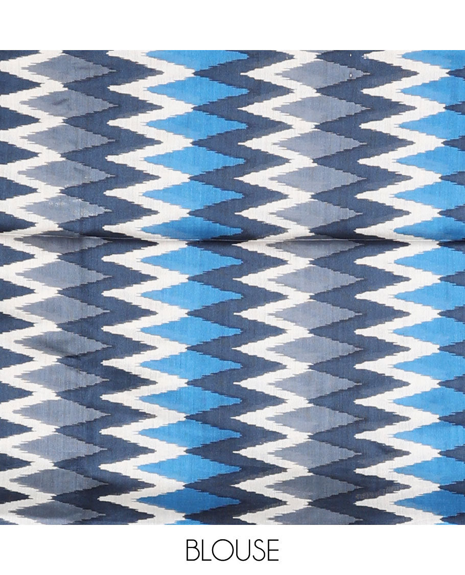 Blue tussar saree with buttas, contrast pochampally ikkat-style geometric patterned border & pallu