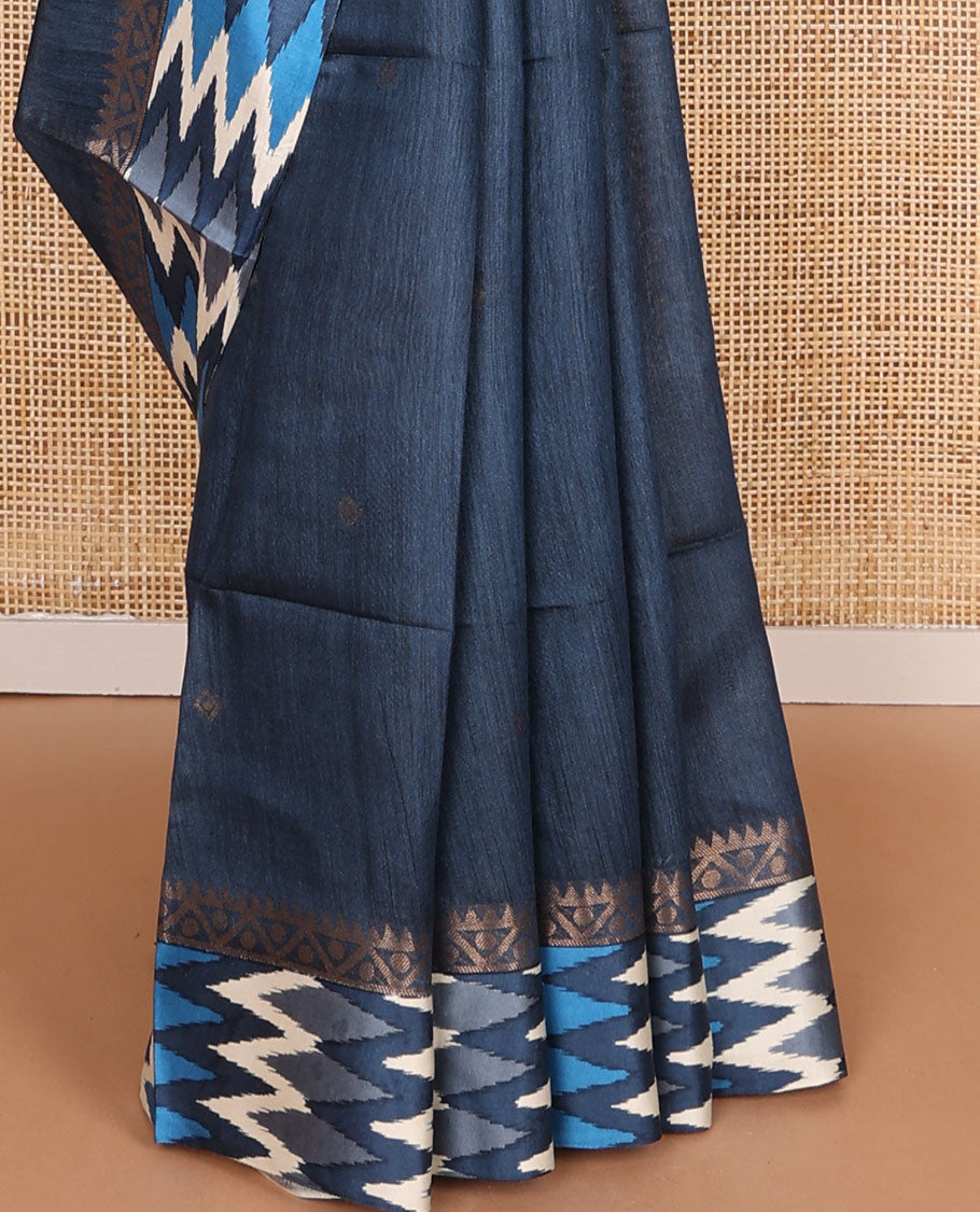 Blue tussar saree with buttas, contrast pochampally ikkat-style geometric patterned border & pallu