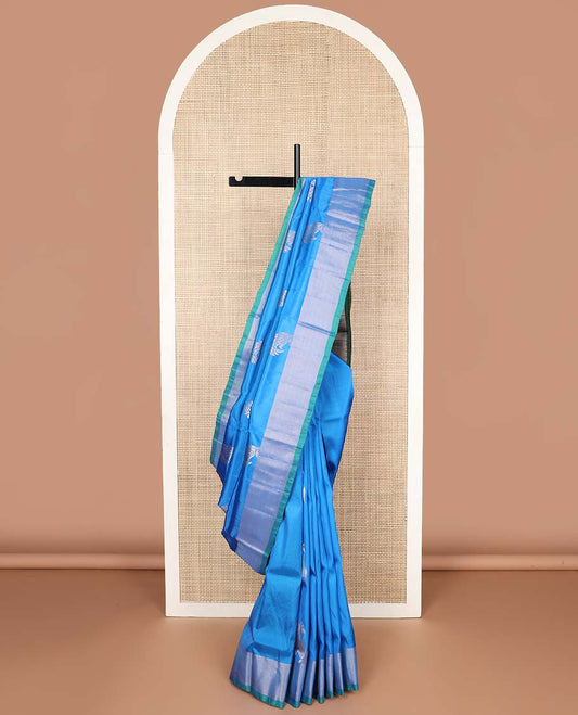 Blue motifs uppada silk saree with self zari border & ogee design pallu