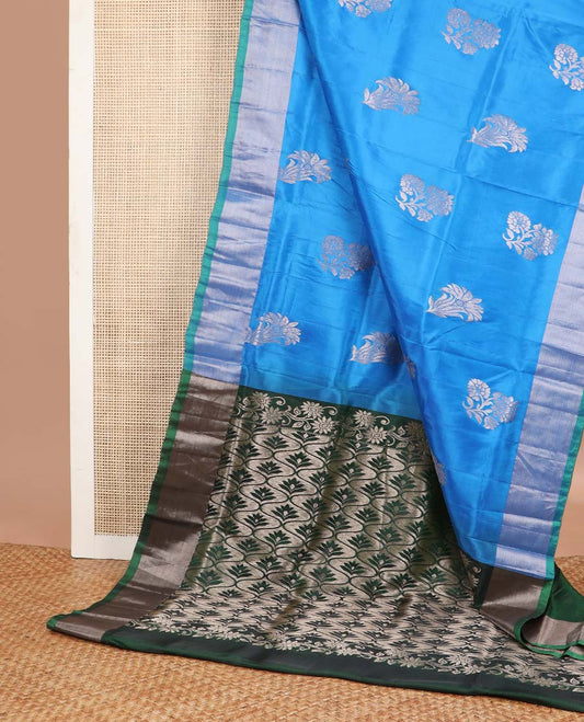 Blue motifs uppada silk saree with self zari border & ogee design pallu