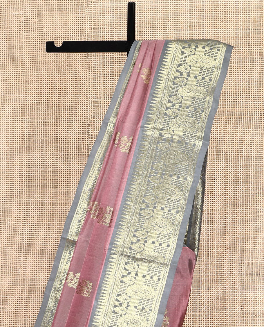 Pink Venkatagiri Silk Saree, Embellished with Zari Buttas All Over Its Body, Complemented by a Contrast Traditional Zari Design Border, Pallu of Thilakam Designs, and Paired with a Contrast Blouse