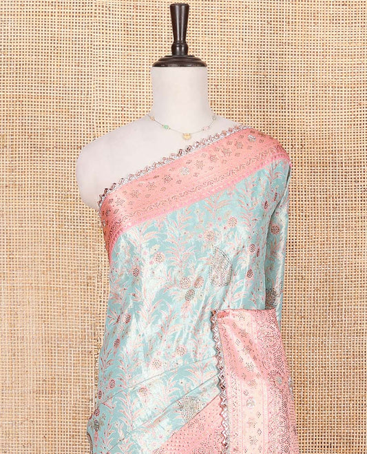 Blue Vastrakala Silk Saree Elegantly Highlighted with Floral Jacquard and Stone Work, Complemented by Contrast Traditional Zari and Stone Embroidered Scallop Border, Mughal-Style Zari Woven Stone Work Pallu, and Paired with Contrast Stone Work Blouse