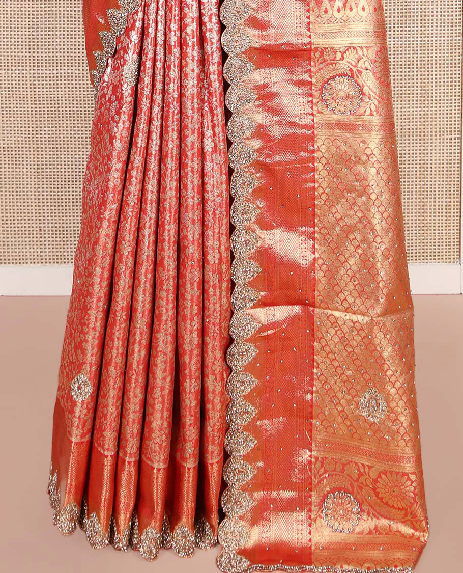 Red Vastrakala Silk Saree, Artfully Detailed with Floral Jacquard and Patch Stone Work, Highlighted by Traditional Zari and Stone Scallop Border, Grand Scallop Design Stone Work Pallu, and Paired with Heavy Embroidered Blouse