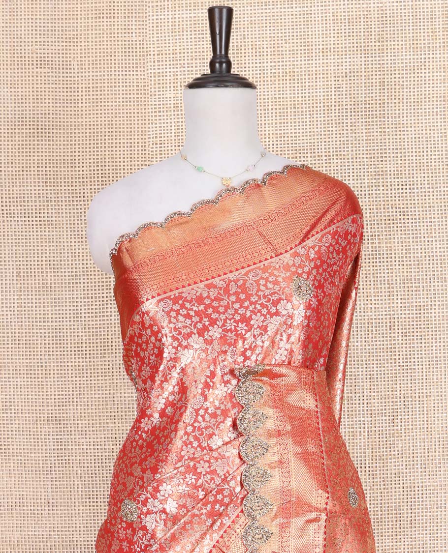 Red Vastrakala Silk Saree, Artfully Detailed with Floral Jacquard and Patch Stone Work, Highlighted by Traditional Zari and Stone Scallop Border, Grand Scallop Design Stone Work Pallu, and Paired with Heavy Embroidered Blouse