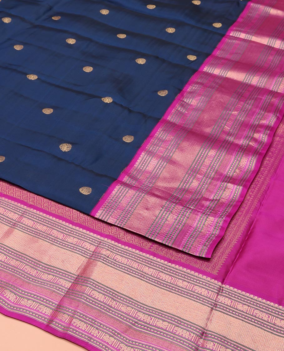 Blue Vasundhara Lite-Silk Mix Saree, Elevated with Chakram Zari Buttas All Over Its Body, Complemented by a Contrast Border of Thilakam Mokku, Banaras, Mayil, Yaanai, and Mayil Kann Designs, Grand Pallu of Jaal Designs, and Paired with a Contrast Blouse