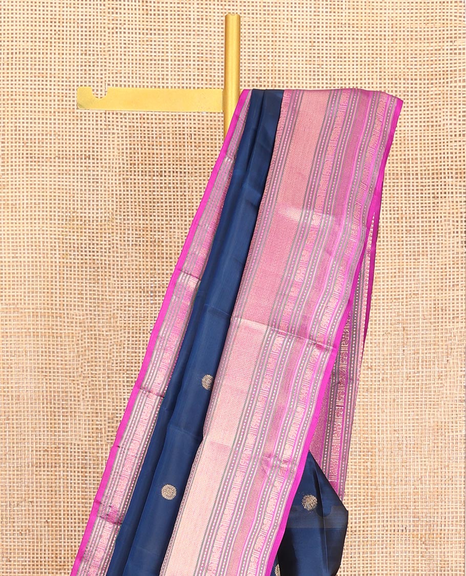 Blue Vasundhara Lite-Silk Mix Saree, Elevated with Chakram Zari Buttas All Over Its Body, Complemented by a Contrast Border of Thilakam Mokku, Banaras, Mayil, Yaanai, and Mayil Kann Designs, Grand Pallu of Jaal Designs, and Paired with a Contrast Blouse