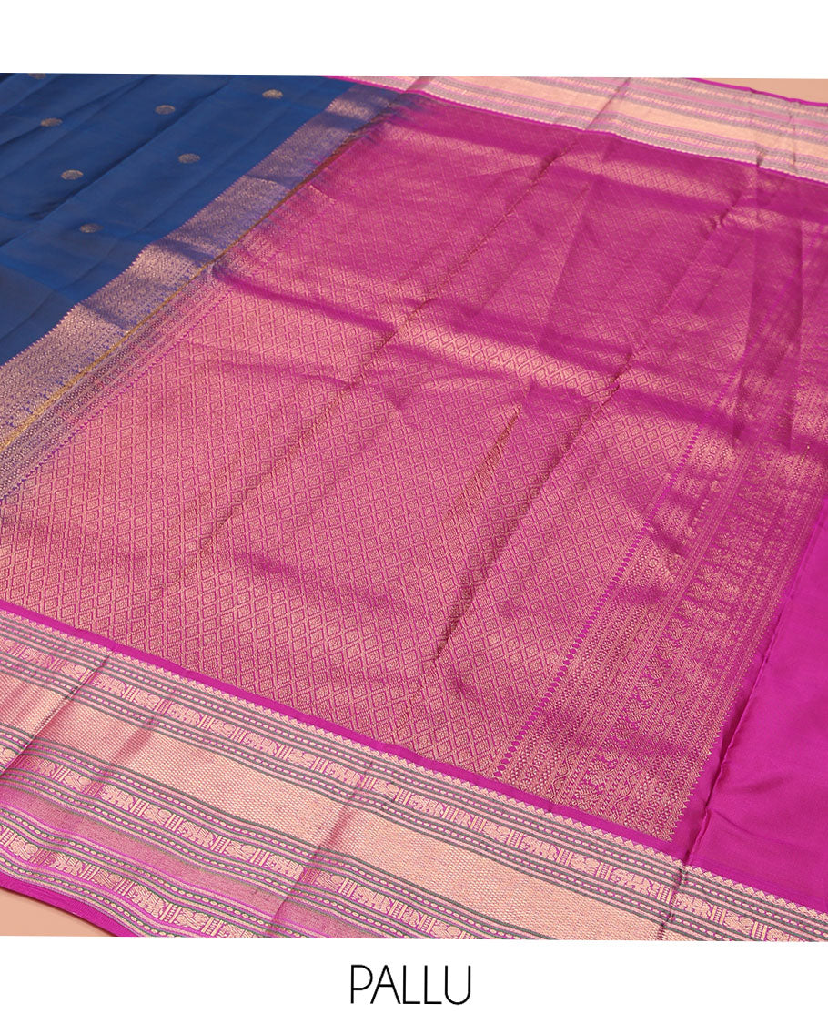 Blue Vasundhara Lite-Silk Mix Saree, Elevated with Chakram Zari Buttas All Over Its Body, Complemented by a Contrast Border of Thilakam Mokku, Banaras, Mayil, Yaanai, and Mayil Kann Designs, Grand Pallu of Jaal Designs, and Paired with a Contrast Blouse