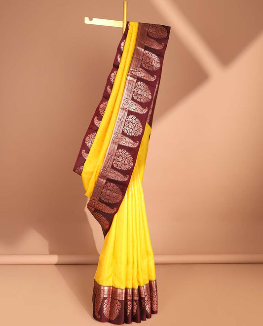 Yellow vasundhara silk mix saree with contrast zari design border & traditional zari design pallu