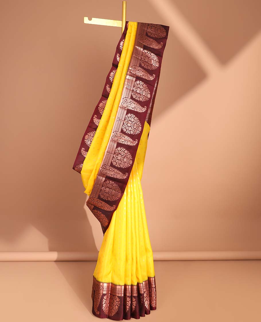 Yellow vasundhara silk mix saree with contrast zari design border & traditional zari design pallu