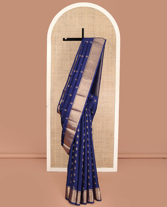 Blue Vasundhara Lite Silk Mix Saree, Elevated with Zari Buttas All Over Its Body, Highlighted by a Zari Border of Thilakam Mokku, and Kodi Visiry Designs, Pallu of Jaal Designs, and Paired with a Matching Blouse