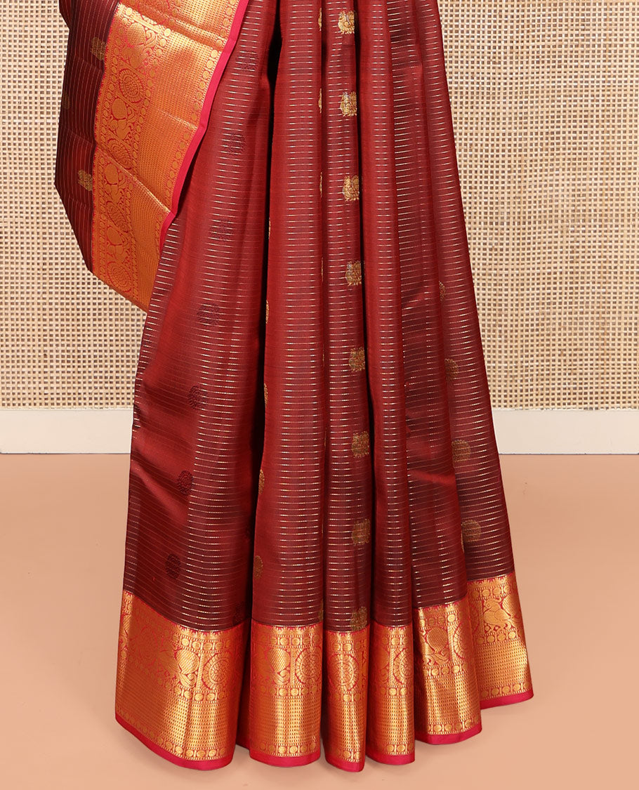 Maroon Vasundhara Lite Silk Mix Saree, Mesmerized with Annam-Chakram Butts and Stripes on Its Body, Complemented by Contrast Border of Thazampoo Rekku, Muthu, Rudraskham, Mayil, and Muthu Designs, Grand Jaal Pallu, and Paired with a Contrast Blouse