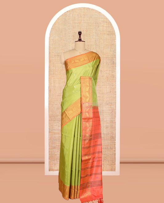 Green Banana Pith Saree, Adorned with Zari Buttas, a Contrast Traditional Zari Border, Striped Pallu, and a Contrast Blouse