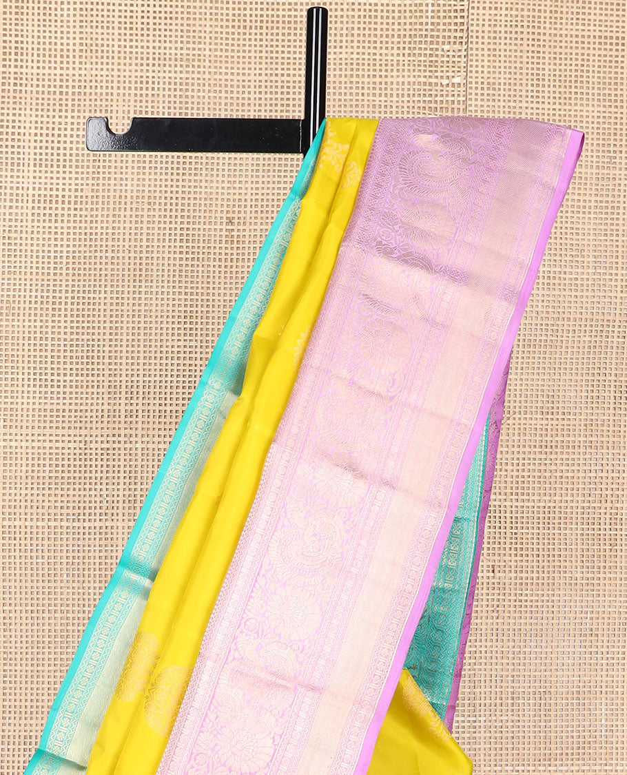 Yellow floral buttas silk saree with contrast ganga jamuna thilakam mokku, paun, kodi visiry, banaras design & zari design pallu