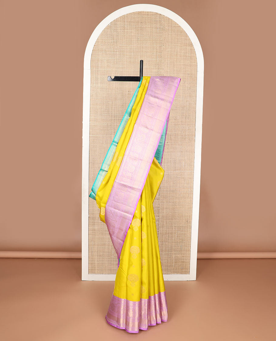 Yellow floral buttas silk saree with contrast ganga jamuna thilakam mokku, paun, kodi visiry, banaras design & zari design pallu