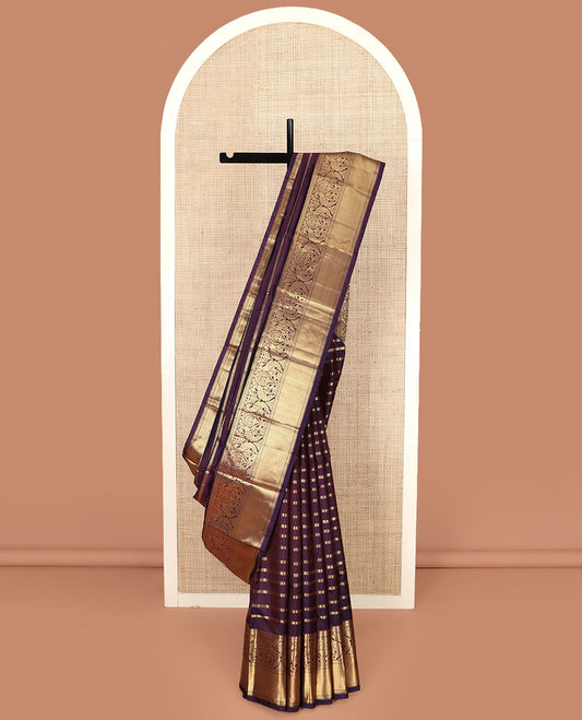 Purple Vasundhara Silk Saree Detailed with Muthu, Neli, and Kathir Zari Stripes, Complemented by a Zari Border of Kathir, Mayil, and Jaal Designs, Opulently Zari Embellished Pallu, and Paired with a Matching Zari-Bordered Blouse