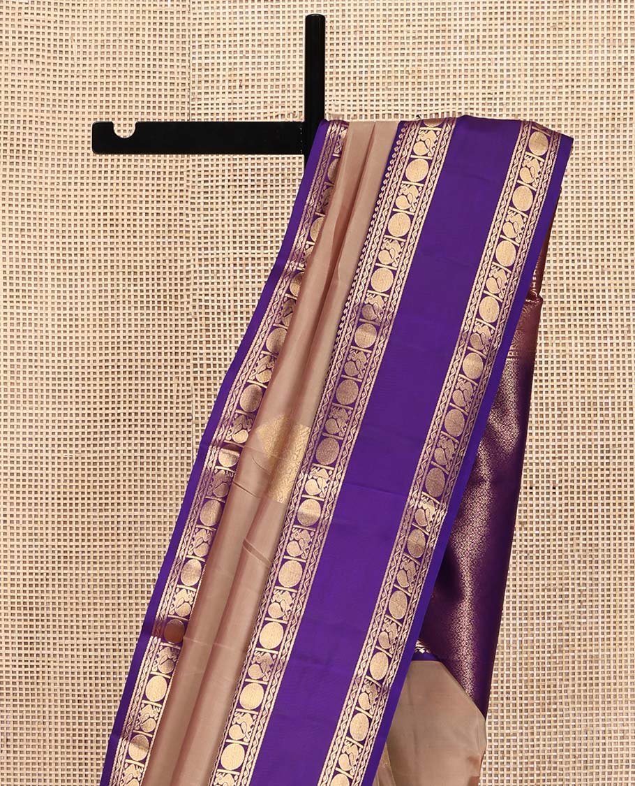 Beige Vasundhara Lite Silk Mix Saree, Accentuated With Zari Buttas All Over Its Body, Complemented by Contrast Rettai Pettu Border of Salngai, Neli, Poun and Mayil Designs, Gleaming Zari Pallu, and Paired with a Contrast Blouse
