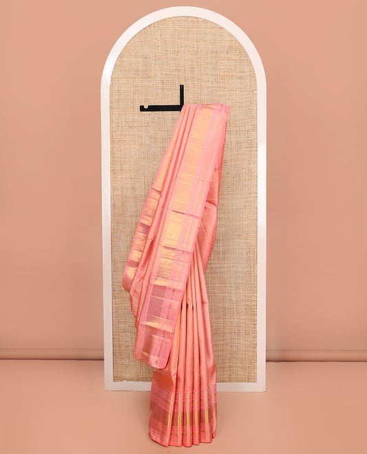 Pink Kanchipuram Wedding Silk Saree, Detailed with Jacquard Design on Its Body, Highlighted by Zari Border of Thilakam Mokku, Muthu, Mayil Kann, Yaanai, and Chakram Designs, Pallu of Mayil Kann Designs, and Paired with a Matching Blouse