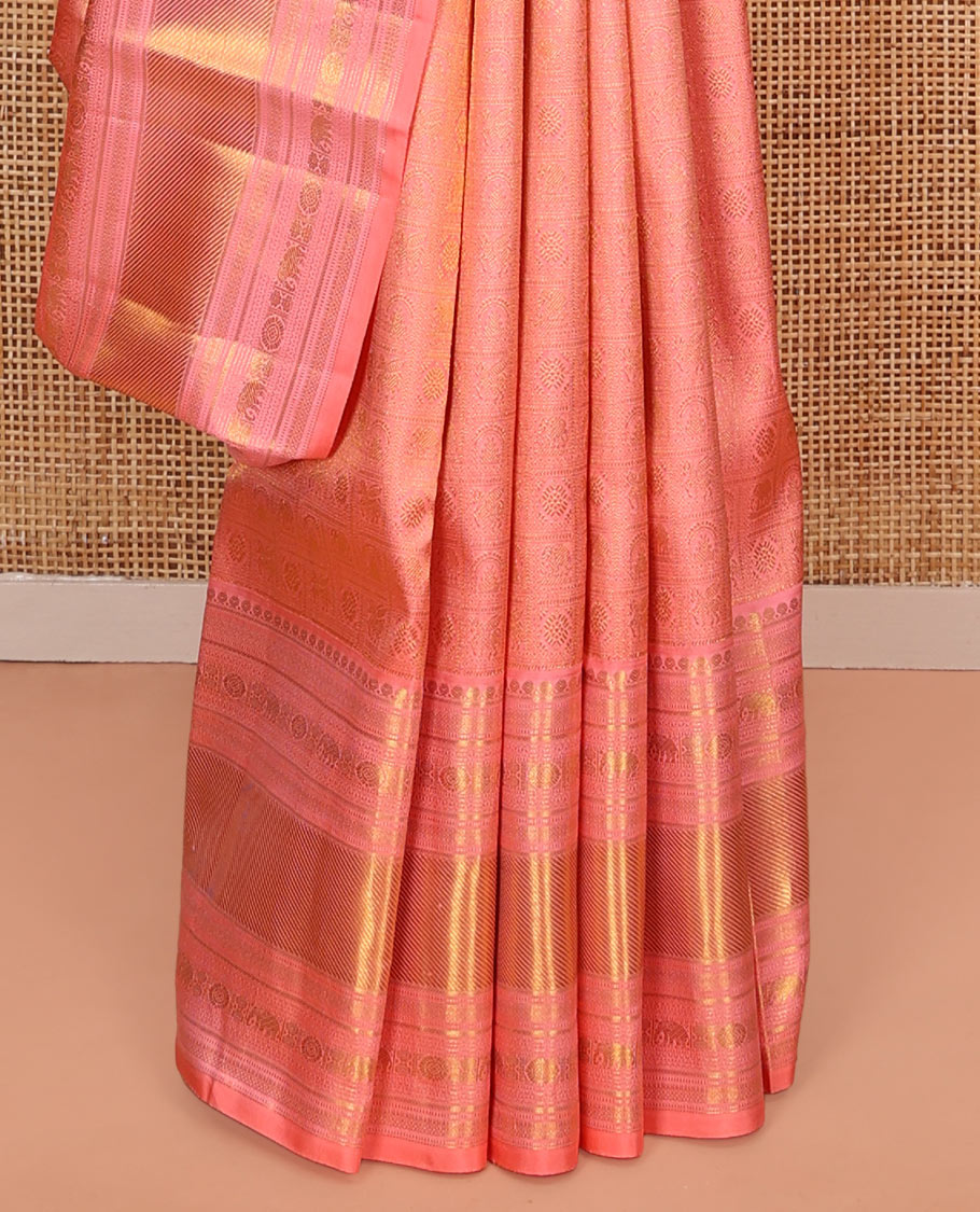 Pink Kanchipuram Wedding Silk Saree, Detailed with Jacquard Design on Its Body, Highlighted by Zari Border of Thilakam Mokku, Muthu, Mayil Kann, Yaanai, and Chakram Designs, Pallu of Mayil Kann Designs, and Paired with a Matching Blouse