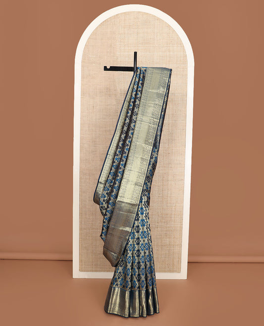 Blue rangkat style jacquard Kanchipuram wedding silk saree, traditional zari border, and pallu of Mughal style floral bouquets