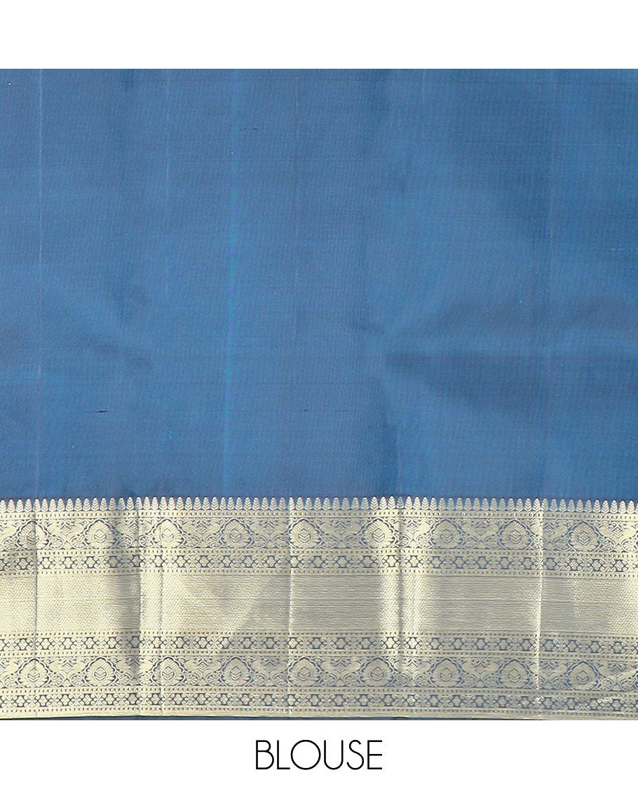 Blue rangkat style jacquard Kanchipuram wedding silk saree, traditional zari border, and pallu of Mughal style floral bouquets