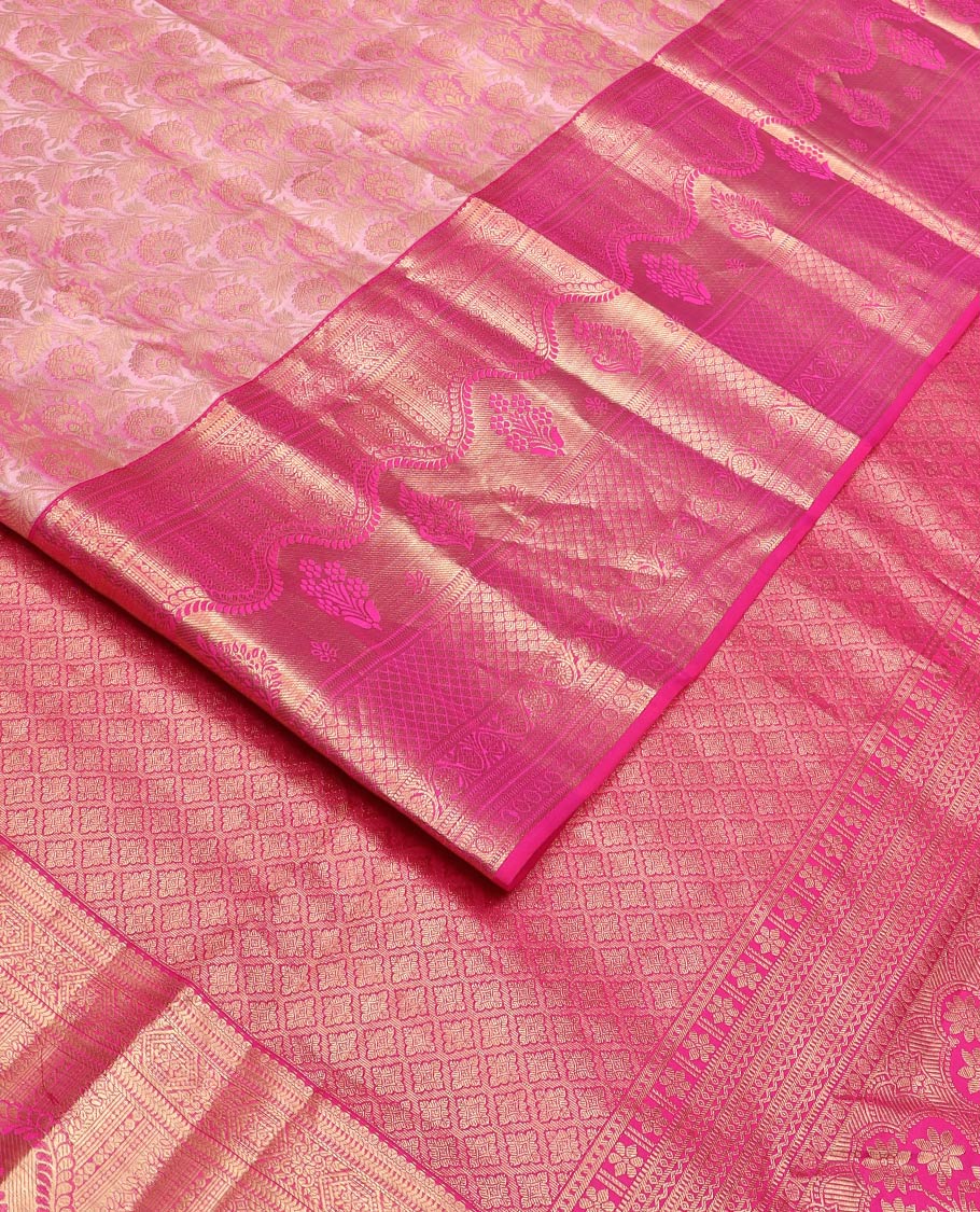 Pink floral jaal jacquard Kanchipuram wedding silk saree, contrast border steeped with traditional zari designs, and zari-rich jaal pallu